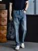 "Doble Capa Clásico" Lavado a la Piedra de Grafito Algodón Amigable con la Piel Ligeramente Holgado Azul Denim para Hombre Anti-Arrugas Duraderos Ajustados Rectos Pantalones
