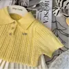 Conjunto de Dos Piezas de Moda para Bebé Niña Estilo Coreano Verano Nueva Moda Estilo Occidental Amarillo Ganso Tejido Polo Manga Corta Falda Plisada