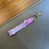 En stock, llavero con colgante de flor pequeña, nuevo colgante de color gelatina, correa de mano, pulsera de cuerda de cuero, pequeño llavero de regalo.