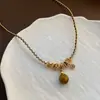 Collar de Piedra Ojo de Tigre con Cuentas Estilo Retro Maillard Otoño e Invierno Cadena para Clavícula Collar Elegante de Moda Joyería para Mujeres Alta Gama
