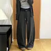 Calça banana de cor contrastante cuidadosamente selecionada feminina outono e inverno nova com cordão drapeado emagrecedor perna larga elegante versátil simples calça de perna curva