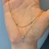 Nuevo Collar Apilado de Circonio Individual Estilo Francés para Mujer Lujo Ligero Nicho Elegante Circonita Súper Brillante Cadena Doble para Clavícula de Viaje Venta al por Mayor