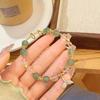 Pulsera de mano de cola de sirena de cristal de fresa dulce súper hada, diseño de lujo ligero exquisito, pulsera para novias al por mayor