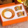 Suministro directo transfronterizo H juego de taza de café de moda juego de té de la tarde europeo taza de té negro café 2 tazas 2 platos caja de regalo