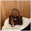 Shuai Mijia 2026 Otoño Nuevo Bolso de Mano de Gran Capacidad Vintage Nicho para Viajar Bolso Cubo de Hombro Único para Mujer