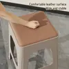 Mesa e cadeiras de sala de jantar e estar multifuncionais transfronteiriças para casa, banquinho de plástico, banquinho de placa moderno, banquinho de couro empilhável para adultos, atacado