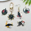 Halloween Sol Luna Flor Cuervo Accesorios DIY Colgante de Aleación Esmaltada Llavero Encanto de Pendiente