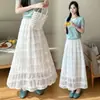 Falda blanca de longitud media para mujer, nuevo estilo otoño e invierno 2026, gasa empalmada con bordes rizados, falda de tarta de línea A, falda larga para mujer