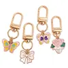 Colgantes de dibujos animados rosas lindos estilo coreano, dijes de aleación de esmalte de conejo y estrella, llaveros con anilla en D, accesorios para manualidades, venta al por mayor