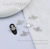 Adornos para uñas de aleación K blanca, mariposa, lago Taihu occidental, adornos para uñas de plata, adornos para uñas con lazo de diamantes.