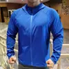 Jaqueta atlética masculina, moletom com capuz, camiseta de secagem rápida com elasticidade em quatro direções para primavera/verão para corrida, fitness e ciclismo, jaqueta corta-vento feminina, conjunto de treino