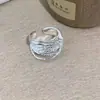 Anillo abierto de múltiples líneas retorcidas de estilo minimalista de alta resistencia europeo y americano, único y elegante con un toque de alta gama, anillo de nicho