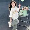 Ropa Infantil Degradada Verano 2026 Nueva Camiseta para Niñas Dibujos Animados Linda Casual Diaria Manga Corta Top Algodón Puro