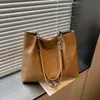 Bolsa Tote Grande Capacidade para Comutação Transfronteiriça Feminina Nova Outono 2026 Bolsa de Mão Popular Moda Bolsa de Ombro Único Sub-braço