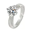 Anillo de diamante asimétrico de diamante abierto moda personalidad cuatro garras 2 Quilates de alta gama incrustado anillo de corindón rojo