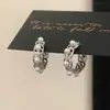 Pendientes de Flores Huecas Brillantes Perlas Café Dorado de Moda Simples Personalizados Exquisitos para Mujer Accesorios de Pendientes de Lujo Ligero Retro