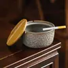 Cenicero de fábrica Wangyun para uso doméstico, elegante y de alta gama, diseño simple, alto valor estético, lujo ligero, cenicero de oficina con tapa