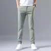Pantalones Casuales Delgados de Seda Helada para Hombre Verano 2025 Pantalones Rectos Ajustados de Moda Pantalones de Color Sólido Elásticos Versátiles