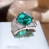 Tiktok en vivo nuevo estilo imitación palaiba twist anillo Qiankun verde lago diamante de alto carbono tesoro colorido anillo abierto