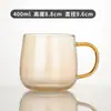 Venta al por mayor de fábrica taza de café de vidrio con asa estilo nórdico taza de leche taza de barriga grande taza transparente para avena desayuno