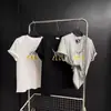 Camiseta Trendy Estilo Americano de Manga Curta para Mulheres, Novo Modelo de Verão 2026, Estampa Divertida de Cachorro, Top Soltinho Preto