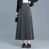 Saia plissada de lã para mulheres, novo modelo outono e inverno 2026, saia de cintura alta em linha A, comprimento médio, fluida, emagrecedora, barra larga, moderna