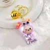 Chaveiro de boneco com capa de cabeça de sapo acrílica banhada a UV, pingente fofo de desenho animado, brinquedo infantil, joias, atacado