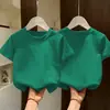 Camisetas de Algodão Puro de Manga Curta para Meninos e Meninas, Estilo Novo Elegante, Soltas e Versáteis, Tops de Meia Manga da Marca da Moda para Crianças