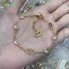 D Brand Versão Alta Di Brand Pulseira Cd para Mulheres Joias Estilo Retrô Europeu e Americano Pulseira de Pérola Borboleta Atacado