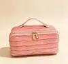 Bolsa de maquillaje de alta gama para mujer, estilo nuevo, gran capacidad, bolsa de cosméticos conveniente, bolsa de tocador de viaje, bolsa de almacenamiento de cosméticos