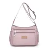 Bolsa de tela de nailon impermeable mochila cruzada bolsa de hombro multicolor simple 2024 nueva bolsa de ocio para mujeres de mediana edad y mayores