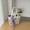 Bolso de Mano Simple Estilo Coreano con Patrón de Lichi para Mujer 2026 Nueva Moda de Gama Alta Versátil Bolso Cruzado Cubo