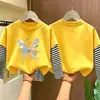 Camiseta de manga larga para niña, nuevo estilo primavera/otoño 2026, base infantil moderna y linda, conjunto de otoño de algodón puro, top tipo dos piezas
