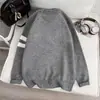 Suéter de medio cierre estilo americano para hombre, tejido casual de moda suelto para otoño e invierno, prenda exterior de alta gama para parejas
