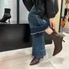 Botines de tacón de aguja negros de punta fina estilo coreano para mujer, zapatos versátiles de tacón alto para otoño e invierno, hechos de cuero con patrón de lichi con diseño elástico ajustado