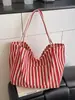 Bolso de lona a rayas verticales simple artístico estilo coreano, gran capacidad, bolso de hombro casual y versátil para mujer, transfronterizo