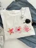 Camiseta Casual Feminina com Estampa de Letras e Estrelas, Gola Redonda e Manga Curta