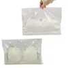 Al por mayor de fábrica sujetador sujetador cierre de sujetador bolsa de almacenamiento logo transparente bolsa con cremallera para pantalones de traje de baño bolsa de embalaje para ropa interior ahora