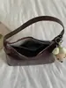 Bolso de mano para mujer Shuai Mi Jia 2026 nuevo de principios de otoño, bolso vintage para hombro o axila, bolso cruzado de alto valor para el día a día