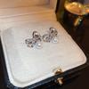 Pendientes de plata con forma de mariposa y flor de perla retro francesa, pequeños y exquisitos, de alta gama, con diseño de hada súper dulce para mujer.