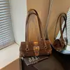 Bolso de axila de moda nuevo para mujer, bolso de mano estilo coreano patchwork vintage 2026 nicho estampado de leopardo de un solo hombro