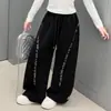 Conjunto stylish de dos piezas para niña para salir: top de otoño ajustado de manga larga con estampado de letras y pantalones de pierna ancha de moda hasta el suelo