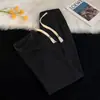 Pantalones vaqueros rectos retro de estilo americano para hombre, pantalones casuales holgados de primavera y otoño con cintura holgada y cordón ajustable con un diseño de nicho.