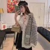 Chaqueta corta estilo Chanel para mujer otoño e invierno网红 suéter holgado estilo perezoso abrigo primavera y otoño versión coreana cárdigan de punto a cuadros