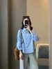 Camisa casual de estilo coreano de manga larga con rayas verticales de corte holgado y cuello de corbata, top corto de otoño para mujer
