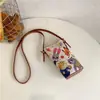 Mochila Retro Americana con Estampado de Leopardo y Gatito para Mujer 2026 Nueva Versátil Elegante Pequeña para Viaje y Trayectos Tendencia