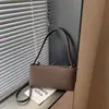 Bolso de Axila de Estilo Francés Transfronterizo de Nicho para Mujer Nuevo Modelo 2026 Bolso Tote Simple y Elegante Bolso Cruzado de Alto Valor