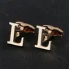 Dorado 26 letras inglesas lisas gemelos de hombre creativos para camisa