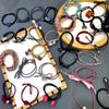Elásticos Versáteis para Cabelo Acessórios de Cabelo Feitos à Mão Atacado Yiwu Faixas de Cabelo 15 Fitas Que Não Danificam o Cabelo Alta Elasticidade