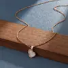 Nueva cadena de clavícula de lujo estilo coreano, collar versátil de acero de titanio de moda para mujer, colgante simple clásico de circón, accesorio versátil